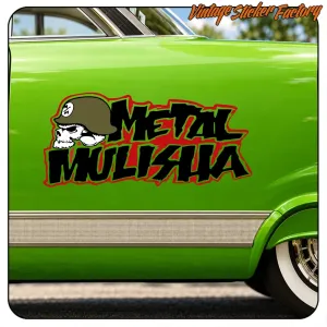 METAL MULISHA design applied to the door of a green car
