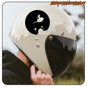 Black-and-white circular design applied to a light-coloured motorcycle helmet