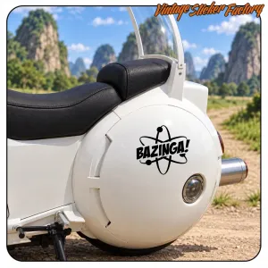 Black BAZINGA! sticker with atomic symbol, applied to a white motorcycle