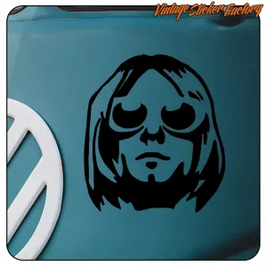 Stilisiertes schwarzes Porträt von Kurt Cobain auf einer blauen Oberfläche