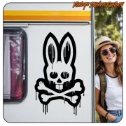 Skull with crossed bones applied to the side of a caravan