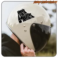 View of the light helmet with the black «ARTIC MONKEYS» text applied