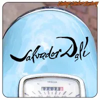 Text «SALVADOR DALÍ» applied to the blue bodywork of a motorcycle
