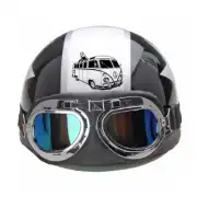 Classic camper van drawn in white on a black helmet with goggles