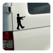 Schwarze Silhouette von Frankenstein beim Gehen an der Seite eines weißen Transporters