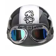 Kitty Zombie sticker applied to the top of a helmet with goggles