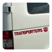 Red TRANSPORTERS sticker with graphic emblem applied to the rear side of a van