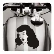 Black and white pin-up design applied to a motorcycle fuel tank