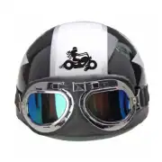 Casque noir avec lunettes et silhouette d’un motard sur une moto dans la bande centrale