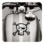 Skull with crossed bones applied to a motorcycle fuel tank