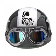 Cheshire Cat sticker applied to the top of a helmet with goggles