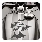 Five black bats applied to the fuel tank of a motorcycle