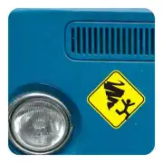 Tornado sticker applied next to the front headlight of a blue vehicle