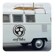 SURF TRIBE sticker applied to the side of a camper van