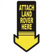 Diseño vertical «ATTACH LAND ROVER HERE» con flecha hacia abajo