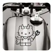 Sticker of the horned character applied to a motorcycle fuel tank