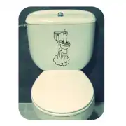 Sticker with a toilet and hand design applied to a toilet cistern