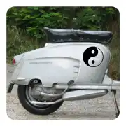 Yin yang sticker placed on the side of a classic scooter