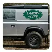Oval «LANDY LIFE» sticker placed on the side of an off-road vehicle