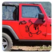 Black Super Mario Bob-omb applied to the door of a red off-road vehicle