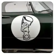 Black piston applied to the door of a classic car