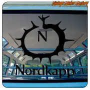 Nordkapp sticker applied inside a vehicle, with circular symbol and black text