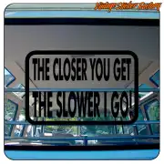 «THE CLOSER YOU GET THE SLOWER I GO!» sticker applied to the rear of a vehicle